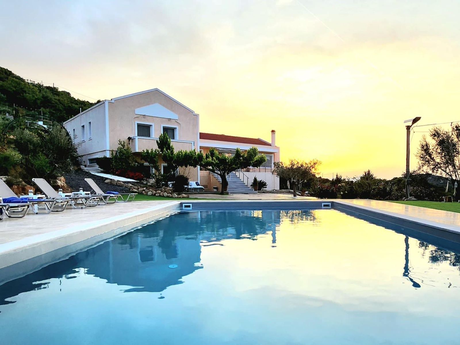 Sunset over the sea at the EAT. PRAY. LOVE. retreat in Greece